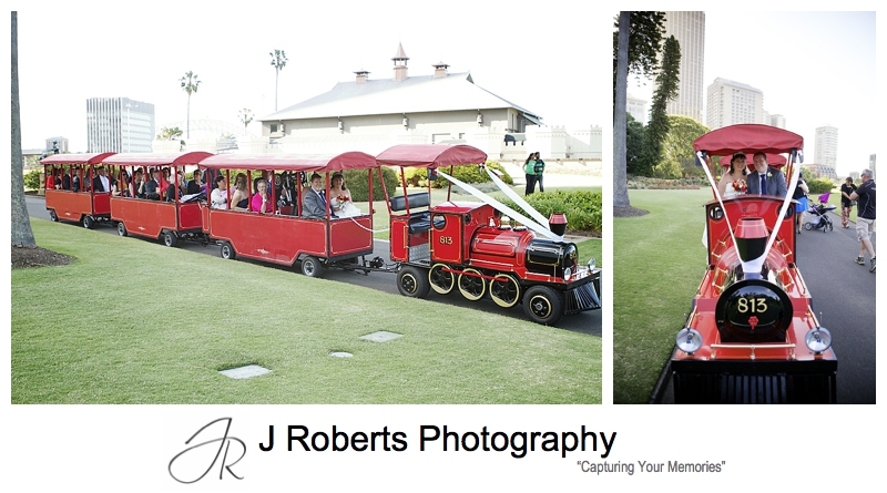 Little red train transporting guests at the royal botanic gardens sydney - sydney wedding photography 